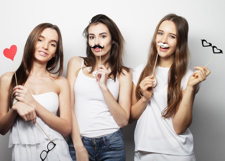 Happy time. Stylish sexy hipster girls best friends ready for party.の写真素材