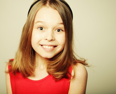 pretty little girl in red dress