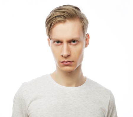 handsome man in white shirt, studio shot isolated on white background.の写真素材