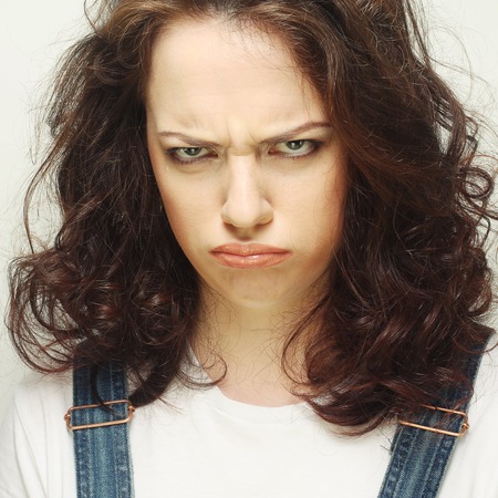 Portrait of dissatisfied young woman