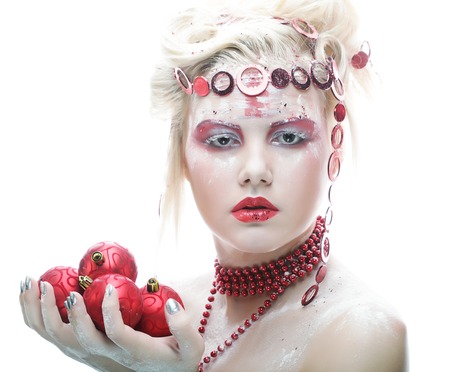 Portrait of beautiful blonde winter snow queenの写真素材