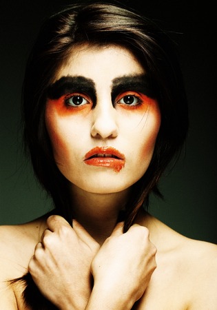 Sadness. Portrait young woman in depression.Creative make-up.
の写真素材