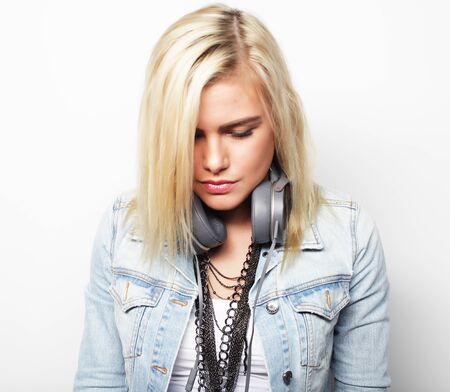 Young cute smiling girl on white backgroundの写真素材