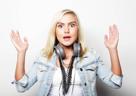 Beautiful young surprised blond woman.