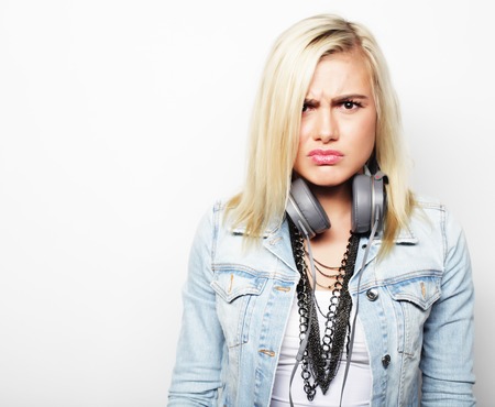 Young cute smiling girl on white backgroundの写真素材