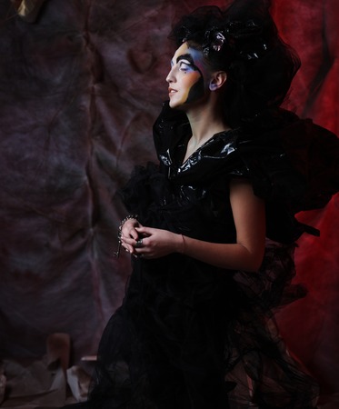 Portrait of young stylisn woman with creative visage. Halloween party.の写真素材