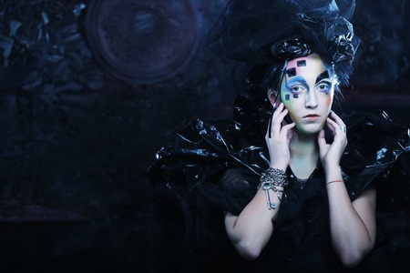 Portrait of young stylisn woman with creative visage. Halloween party.