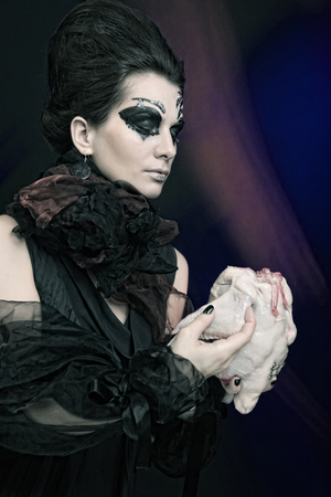 halloween queen with chicken carcassの写真素材