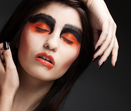 Portrait young woman in depression.Creative make-up.の写真素材