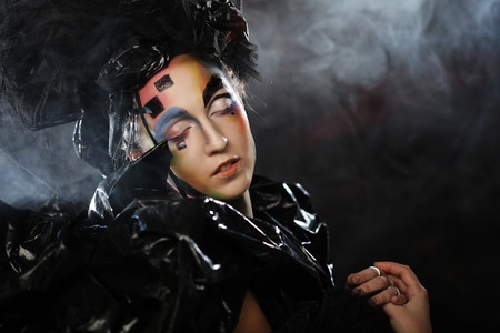 Portrait of young stylisn woman with creative visage.の写真素材