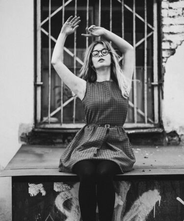 young woman in the city, summer time, black and white pictureの写真素材