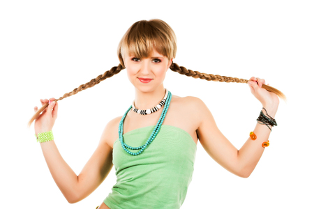 Beautiful young girl with braidsの写真素材
