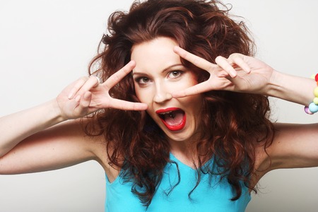 young expressive redhair womanの写真素材