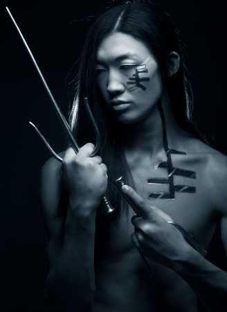 asian boy with weaponsの写真素材