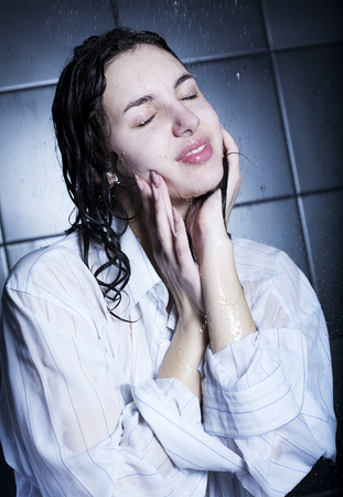 girl taking a showerの写真素材