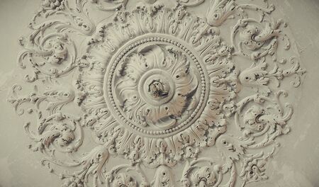 Stucco on the ceiling in the old roomの写真素材