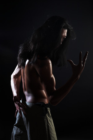 sporty man over black backgroundの写真素材