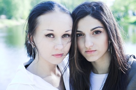 Two attractive girls  in the park