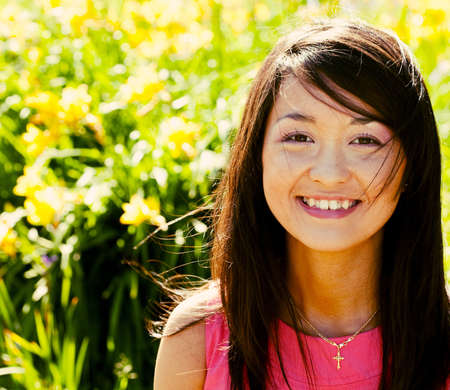 Beautiful asian woman relaxing at parkの写真素材