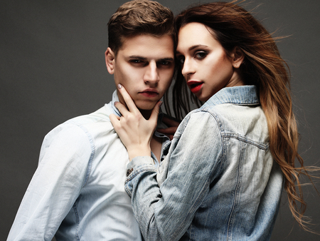 fashion and people concept: Fashion shoot of a sexy coupleの写真素材