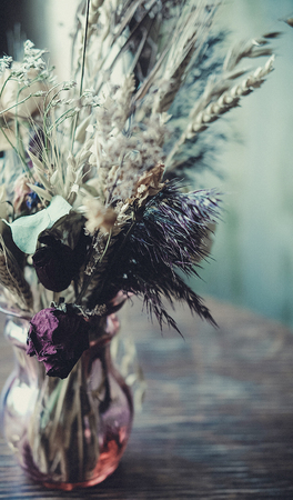 bouquet of dried flowers on the tableの写真素材
