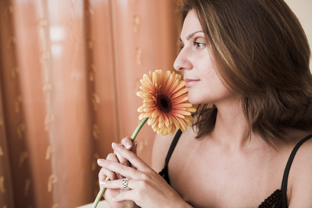 beautiful woman with gerberの写真素材