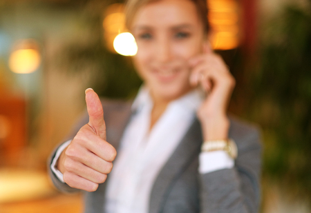 Business woman talking on the mobile phoneの写真素材