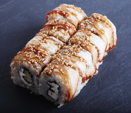 Maki rolls with over grey background. Japanese Sushi. close up.の写真素材