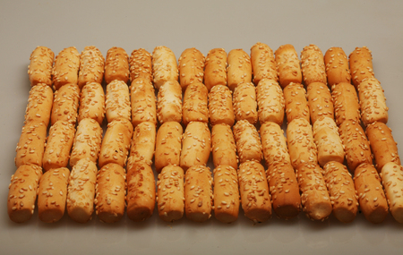 Snack to beer. Wheaten crackers. Isolated over white.の写真素材