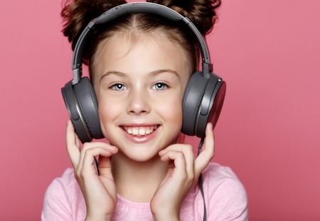 happy girl  with headphones listening to musicの写真素材