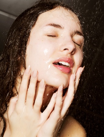 girl taking a showerの写真素材