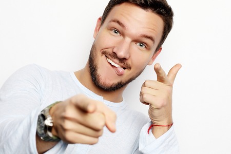 portrait of a young  man surprised face expressionの写真素材
