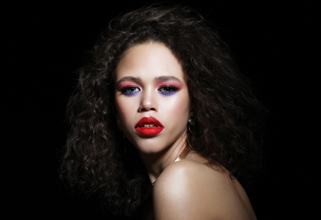 Fashion and beauty concept: attractive african american woman closeup portrait