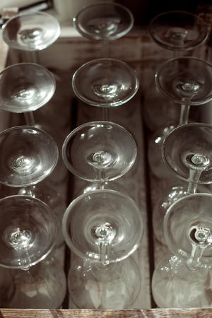 many glass goblets, dishes close-upの写真素材