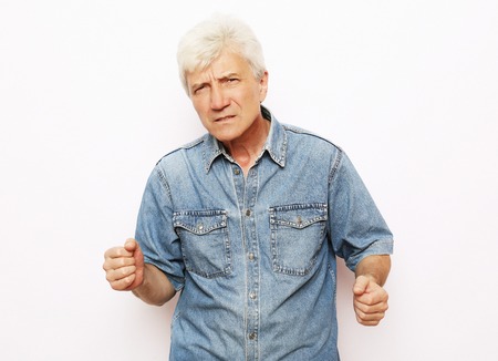lifestyle and people concept: scared old man