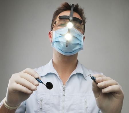 Dentist with mirror and hook - closeupの写真素材