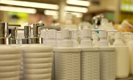 white bottles for soap in the store close upの写真素材