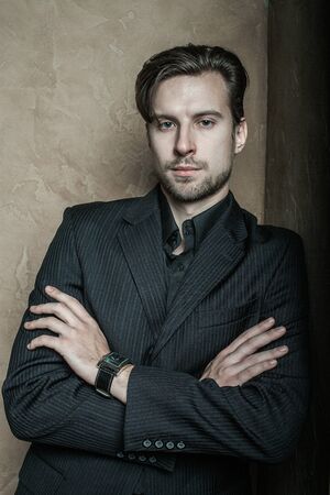 sexy fashion male model dressed elegant - casual posing