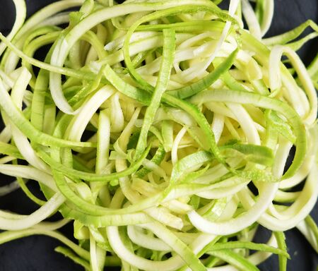 sliced zucchini, spiral, diet food, low-carb nutrition, close up