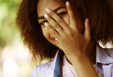 lifestyle, emotion and people concept: Attractive African American woman