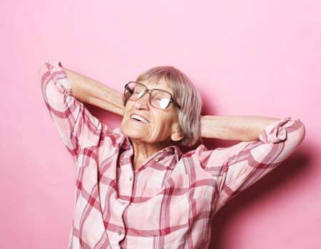 lifestyle, emotion and old people concept: Grey haired elderly nice beautiful laughing woman wearing...