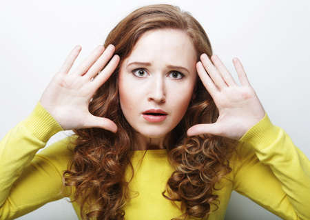 Young surprised woman wearing casual, smile and happy white pink background