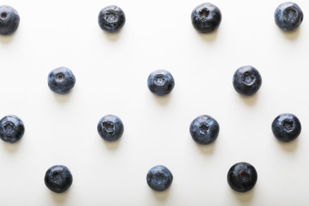 pattern of fresh blueberries on a white background, food conceptの写真素材