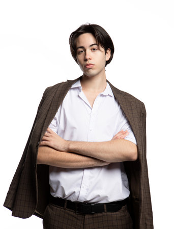 Attractive teenage boy posing in studioの写真素材
