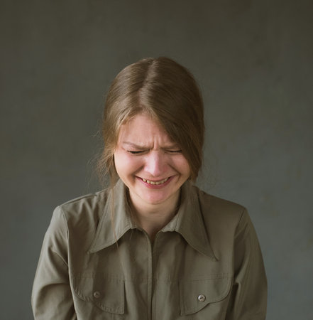 The woman is crying.の写真素材