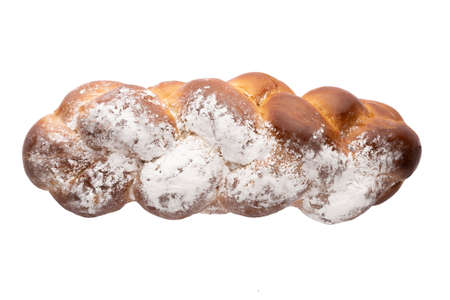 Fresh bread isolated on white background.  Freshly baked bun on a white plate. Bread viewed from...