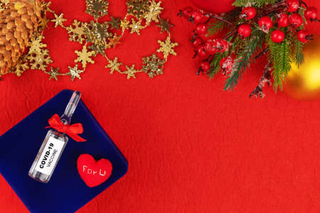 New tested vaccine for COVID-19 on blue holiday box