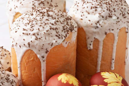 Orthodox Easter. Easter cakes and colored eggs. Traditional Kulich, Paska Easter Bread. Closeup