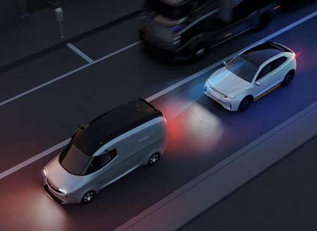 White SUV emergency braking to avoid car crash. Automatic Emergency Braking (Emergency brake system) concept. Night scene. 3D rendering image.の写真素材