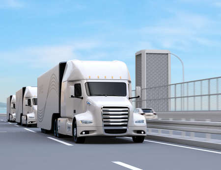 A fleet of white self-driving Fuel Cell Powered American Trucks driving on highway. 3D rendering image.の写真素材